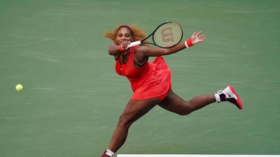 Serena Williams returns a shot to Sloane Stephens during the third round of the US Open. AP Photo