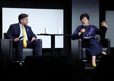 Yuriko Koike, governor of Tokyo, with Ahmed Jasim Al Zaabi, chairman of the Abu Dhabi Department of Economic Development, in Tokyo. Chris Whiteoak / The National