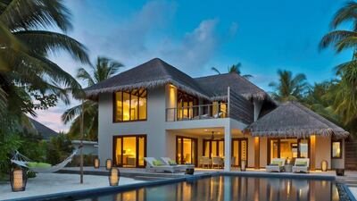 The Dusit Thani Maldives’ beach residence. Courtesy Dusit Thani Maldives