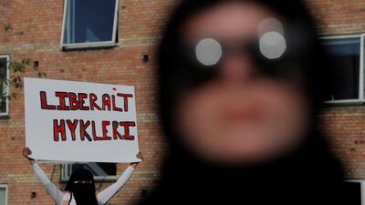 People participate in a demonstration against the Danish face veil ban. Reuters