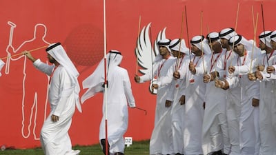 Emirati Al-Ayala dancers put on a performance before Larrazabal's trophy ceremony on Sunday. Kamran Jebreili / AP