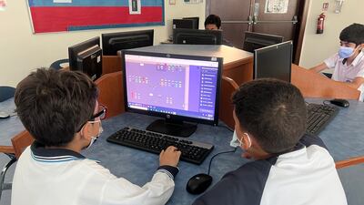 Pupils in the UAE use a computer as they participate in the programme. Photo: Games for Change
