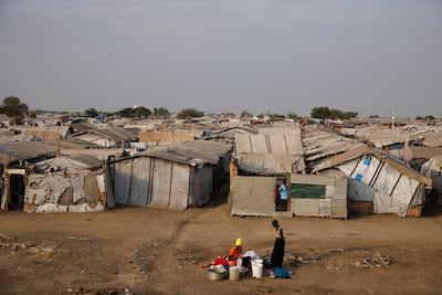 Women wash clothes in a displaced people's camp on November 30, 2023 in Bentiu, South Sudan. Getty Images