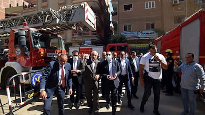 Egypt's Prime Minister Mostafa Madbouly visits the Abu Seifein church, which was gutted by a blaze blamed on an electrical fault. AFP