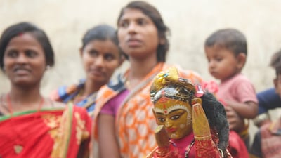 The handmade puppets are decorated with bright colours using natural dyes.