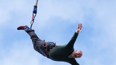 Liberal Democrat leader Ed Davey takes part in a bungee jump during a visit to Eastbourne Borough Football Club in East Sussex, while on the General Election campaign trail. PA