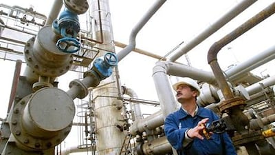 A worker at an oil refinery in Sulaimaniya, in Kurdistan. Iraq is in discussions with French oil major Total for a massive $7bn investment to develop oil and gas fields, AFP