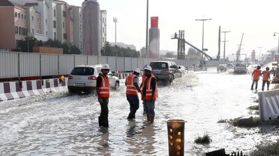 Waterlogging near the under construction Dubai Metro site after rain in Discovery Gardens. Pawan Singh / The National