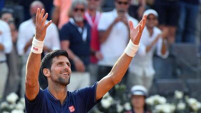 Novak Djokovic celebrates after his Italian Open victory against Roberto Bautista Agut. Ettore Ferrari / EPA