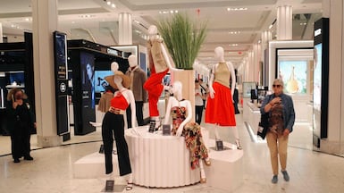People shop at a Macy's in New York City. Getty Images / AFP