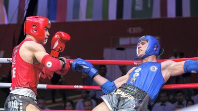 Ilyass Habibali, left, defeated Khaled Tarraf in the 81kg final at the IFMA Asian Championship in Abu Dhabi. Ruel Pableo for The National