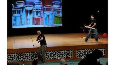 The Punk Science presenters John Milton, left, and Daniel Carter-Hope use gestures, balls and creativity to put on a show for students about climate change. Delores Johnson / The National