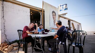 In addition to essentials such as water and electricity, the residents have brought in a playground and laid AstroTurf outside some homes.