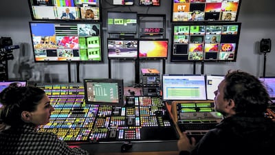 Television directors at RT in Moscow. AFP