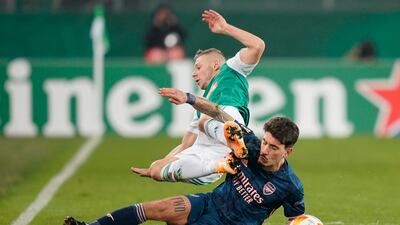 Rapid's Maximilian Ullmann is challenged by Hector Bellerin of Arsenal. Getty