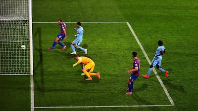 Glenn Murray of Crystal Palace scores the opening goal in his side's 2-1 Premier League win over Manchester City on Monday. Jamie McDonald / Getty Images