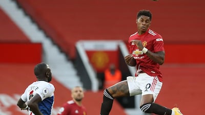 Manchester United's Marcus Rashford wins a header. PA