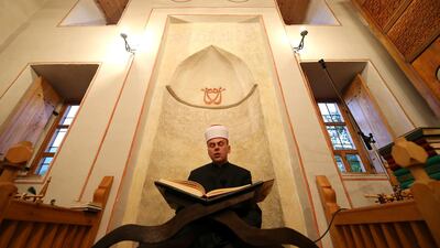 A Bosnian Muslim Imam leads a prayer during the Muslim festival Eid Al Adha at a mosque in Kraljeva Sutjeska near Kakanj, Bosnia and Herzegovina. Reuters