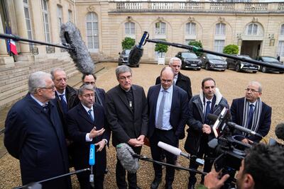 Religious representatives address the media after a meeting with France's President Emmanuel Macron at the Elysee Palace. AP