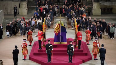 Members of the public pay their respects at the coffin of Queen Elizabeth II at Westminster Hall, London. Reuters