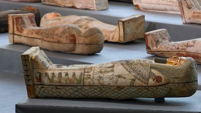 Wooden sarcophagi on display during the unveiling of an ancient treasure trove of more than a 100 intact sarcophagi. AFP