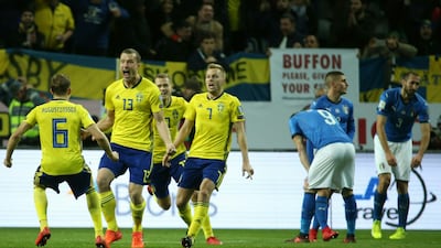 Sweden's Jakob Johansson, second left, celebrates scoring against Italy in their first-leg World Cup play-off win. Soren Andersson / AFP