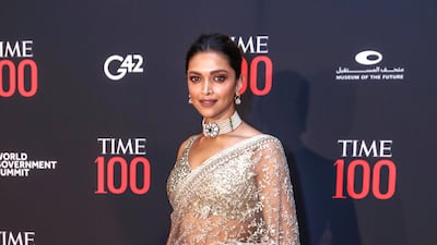 Deepika Padukone shimmers in a saree on the red carpet of the TIME 100 Gala and Impact Awards in Dubai on March 28, 2022. Victor Besa / The National