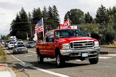 Trump supporters drive in a motorcade outside of Portland, Oregon on September 19, 2020. Reuters