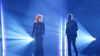 Hosts Reba McEntire and Darius Rucker on stage at the 54th annual Country Music Association Awards in Nashville, Tennessee. Reuters