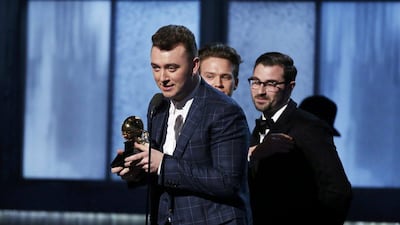 Singer Sam Smith accepts the Song of the Year award for "Stay With Me" during the 57th annual Grammy Awards in Los Angeles. Lucy Nicholson / Reuters