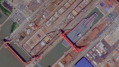 This satellite image from Planet Labs PBC shows China's new Type 003 aircraft carrier as it is prepared for launch. AP
