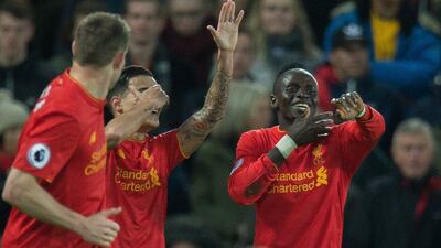 Sadio Mane, right, scored the second goal of Liverpool's 3-1 Premier League win over Arsenal on Saturday. Peter Powell / EPA