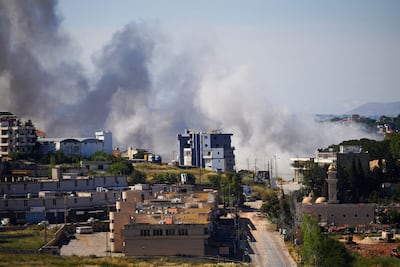 Smoke rises following an Israeli strike in Nabatieh, Lebanon. Reuters