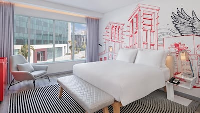 Fully furnished apartments at Radisson Red Dubai have bespoke wallpaper designed by local artists.