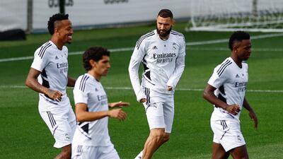 Karim Benzema and Eder Militao with Real Madrid teammates during training on Tuesday. EPA