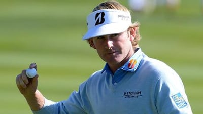 Brandt Snedeker waves to the gallery at Pebble Beach on his way to victory.