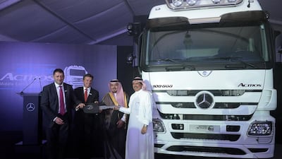 The 100,000th Mercedes-Benz’s Actros lorry sold in the Mena region is handed over to Sheikh Hamoud Al Khaldi, the chairman of Al Khaldi, in the presence of the Mercedes representatives Wolfgang Bernhard and Roland Schneider, plus Sheik Khaled Juffali, the vice president of Saudi Arabia’s Daimler distributor EA Juffali Brothers. Courtesy Mojo