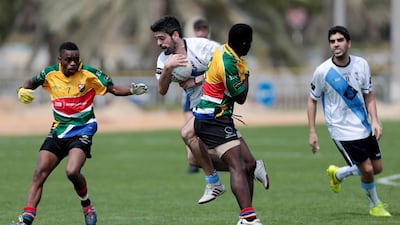 Team South Africa plays against team Galicia during their Gaelic football match during the GAA World Games at Zayed Sports City in Abu Dhabi on March 6, 2015. Christopher Pike / The National