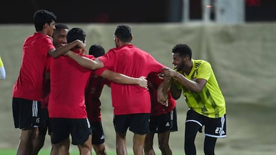 The squad celebrates in training. Courtesy UAE FA