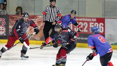 The Abu Dhabi Storms, in grey and red, take on Czech Sparta at the Abu Dhabi Ice Rink on Wednesday, November 16, 2016. Photo courtesy Abu Dhabi Ice Sports Club