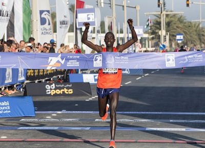 Winner for men’s division 42km Kipserem finishing the race at the ADNOC ABU Abu Dhabi Marathon. Leslie Pableo for The National