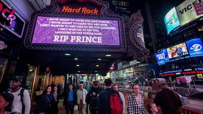 Hard Rock Cafe in Times Square, New York, displayed the lyrics to “Purple Rain” on a purple backdrop. Roy Rochlin / Getty Images / AFP