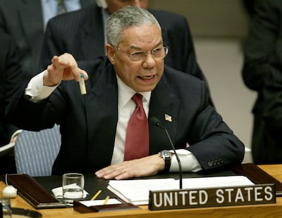 Secretary of State Colin Powell holds up a vial that he described as one that could contain anthrax, during his speech on Iraq to the UN Security Council in 2003. Reuters