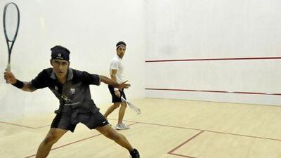 Adil Maqbool, in black, on his way to victory in his final against Aamir Khan.