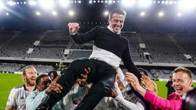 Fulham manager Marco Silva celebrates promotion to the Premier League at Craven Cottage on April 19, 2022. PA