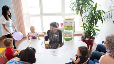 Rabia Riaz leads a group of children through Future Kids’s accelerated learning programme, which uses a training method pioneered by Makoto Shichida of Japan. Clint McLean for The National