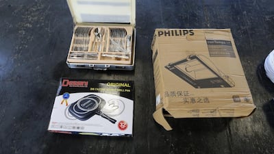 Counterfeit utensils, lighting parts and cooking equipment seized by Dubai Customs in Jebel Ali Port. Sarah Dea / The National