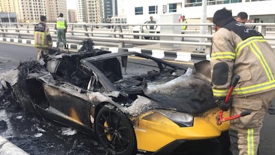 Civil Defence check the Lamborghini Aventador that caught fire in the Dubai Marina. Courtesy James Vincent