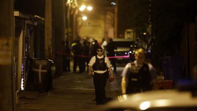 Chicago police officers at the scene of another shooting in the city earlier this month