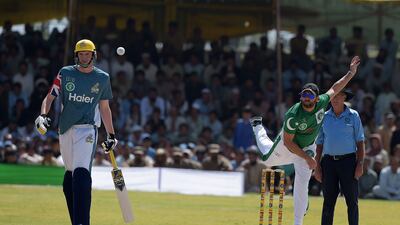 Pakistan XI bowler Shahid Afridi, right, was one of the stars in action during a Twenty20 match against UK Media XI at Miranshah. Aamir Qureshi / AFP